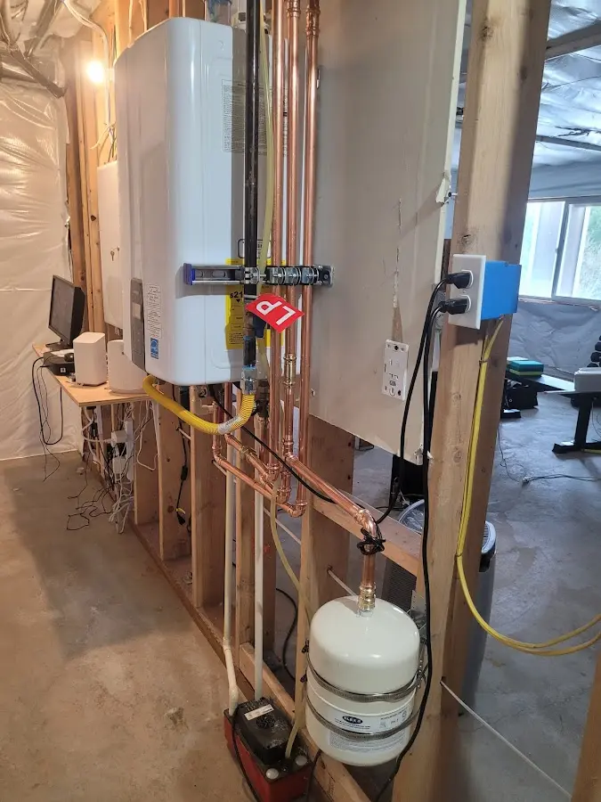 Licensed plumber repairing a kitchen sink in Charleston